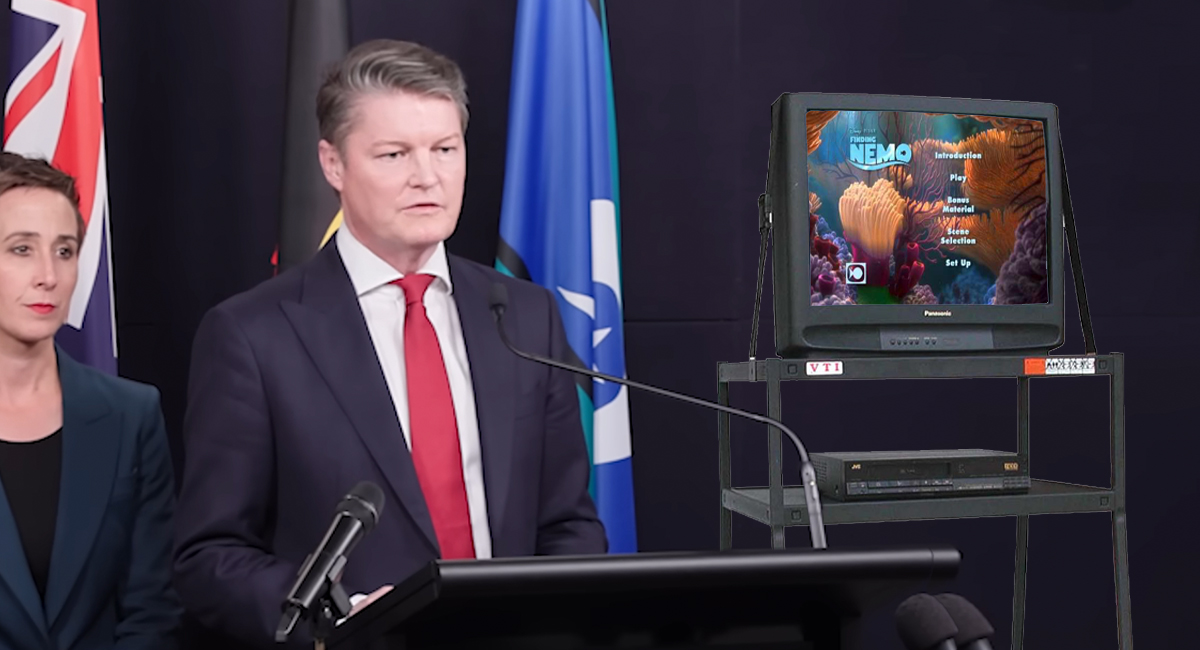 Relief-Premier Carroll wheels out TV so press pack can watch a movie 